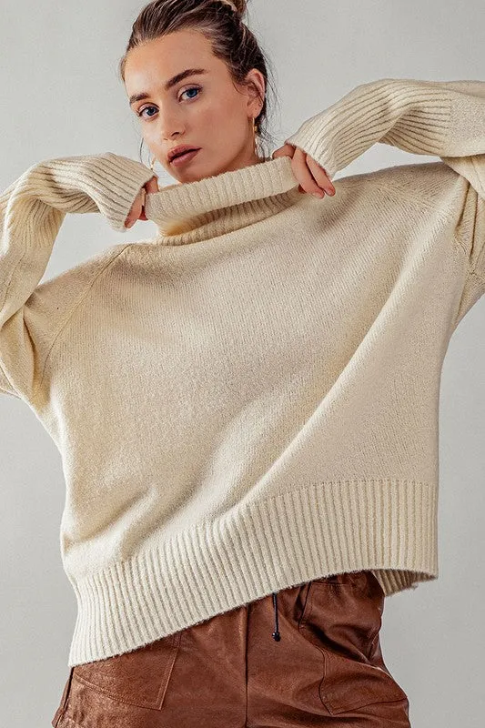 Cream High Turtle Neck Drop Shoulder Knit Top